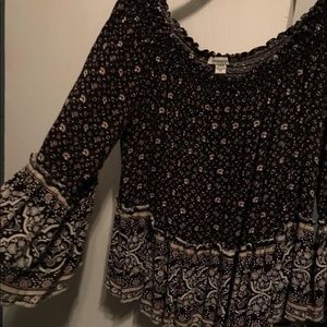 black floral blouse off the shoulder